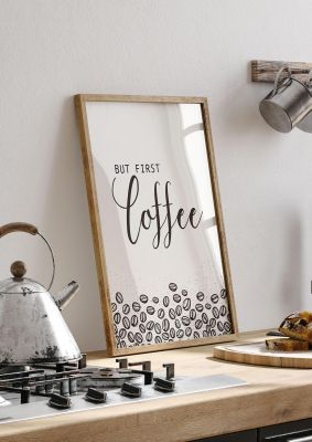 An unframed print of but first coffee quote in typography in grey and black accent colour