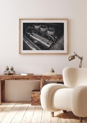 An unframed print of old ferrari engine graphical photograph in grey