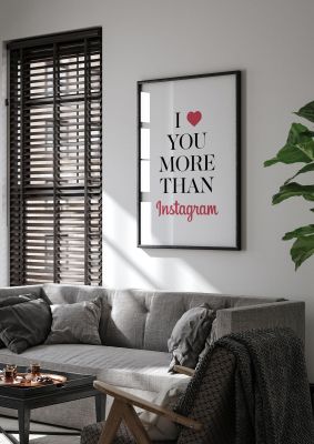 An unframed print of i heart you more in typography in white and red accent colour