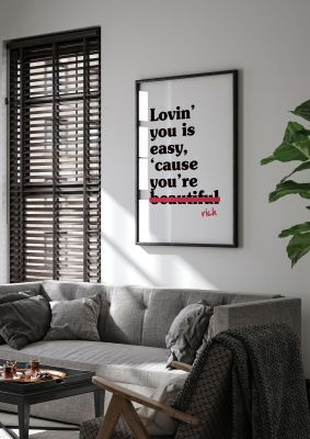 An unframed print of loving you is easy because in typography in white and black accent colour