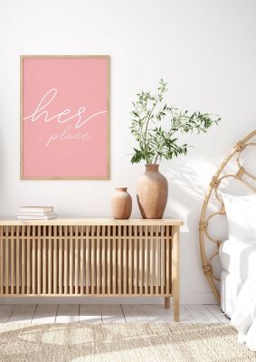 An unframed print of her place quote in typography in pink and white accent colour