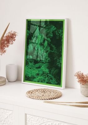 An unframed print of deep green tropical jungle plants nature photograph in green and black accent colour