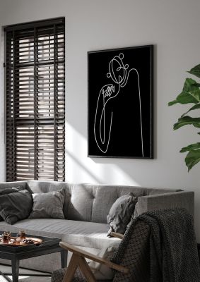 An unframed print of abstract line drawing in black graphical in black and white accent colour