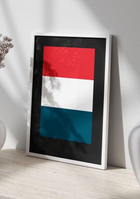 An unframed print of bold geometric three graphical in blue and red accent colour
