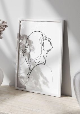 An unframed print of woman line drawing white graphical in white and black accent colour