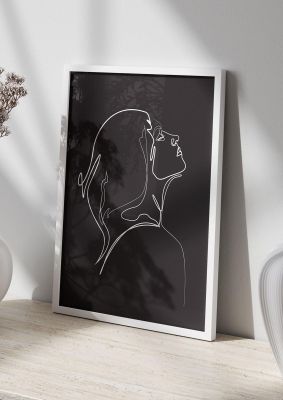 An unframed print of woman line drawing black graphical in black and white accent colour