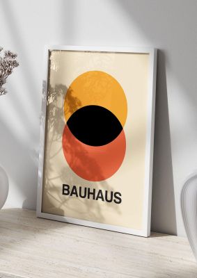 An unframed print of bauhaus eight retro in orange and black accent colour