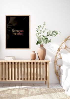 An unframed print of besame mucho typographic funny slogans in typography in black and yellow accent colour