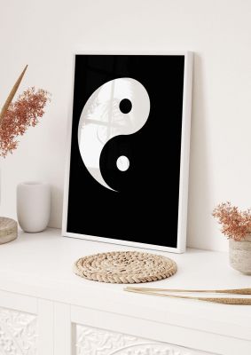 An unframed print of yin yang minimalist graphical in black and white