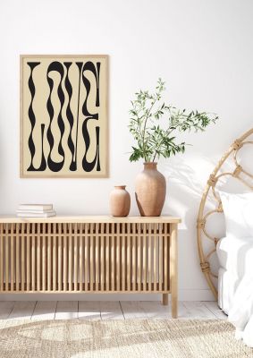An unframed print of love graphical in typography in beige and black accent colour