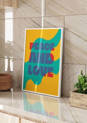 An unframed print of peace and love quote in typography in green and yellow accent colour