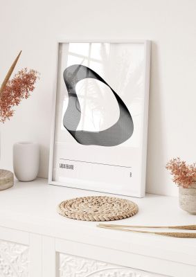 An unframed print of liquid shapes nine monochrome abstract in white and silver accent colour