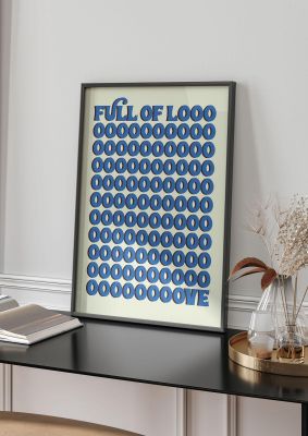 An unframed print of full of looooove blue quote in typography in blue and beige accent colour