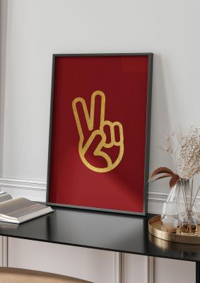 An unframed print of deep red peace sign gold graphical illustration in red and gold accent colour