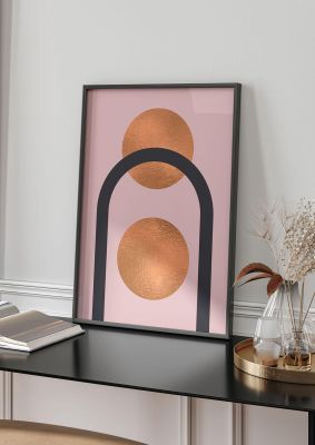 An unframed print of copper and pink abstract one graphical in pink and gold accent colour