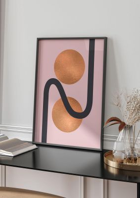 An unframed print of copper and pink abstract two graphical in pink and gold accent colour
