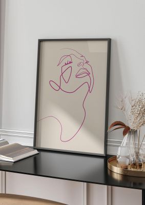 An unframed print of line drawing ectasy face graphical in beige and purple accent colour