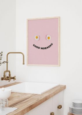 An unframed print of good morning egg face graphical in typography in pink and yellow accent colour