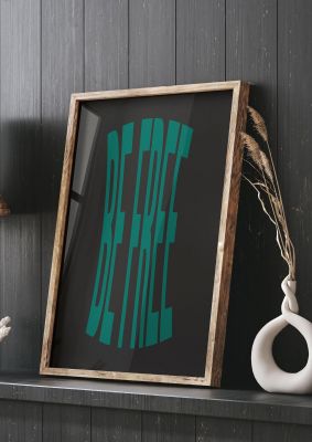 An unframed print of be free quote in typography in green and black accent colour