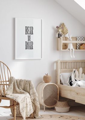 An unframed print of hear me roar quote in typography in white and black accent colour