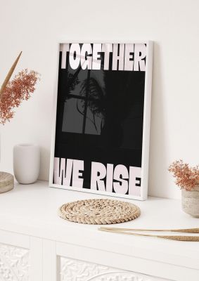 An unframed print of together we rise cutoff funny slogans in typography in black and white accent colour