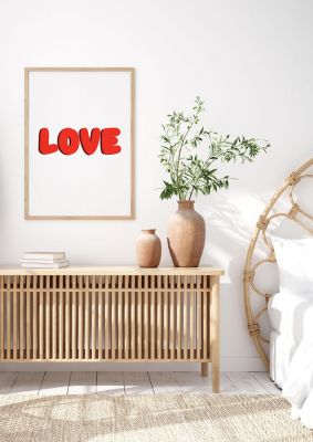 An unframed print of love layered graphical in typography in white and red accent colour