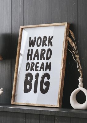An unframed print of work hard dream big bubble quote in typography in grey and black accent colour