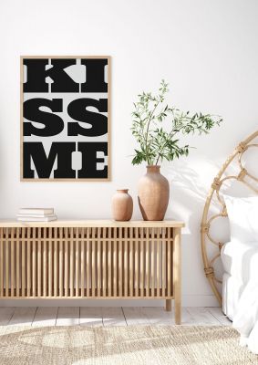 An unframed print of kiss me large letter black graphical illustration in black and white accent colour