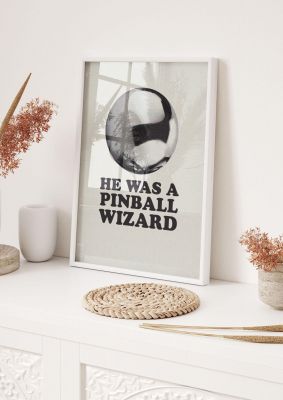 An unframed print of pinball wizard the who lyric halftone music in typography in beige and black accent colour