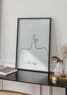An unframed print of the kiss line drawing grey graphical in grey and black accent colour