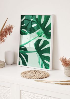An unframed print of grainy tropical leaf green botanical photograph in green and white accent colour