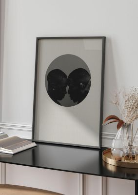 An unframed print of halftone kiss one graphical photograph in grey and black accent colour