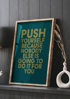 An unframed print of push yourself motivational quote in typography in green and blue accent colour