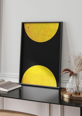 An unframed print of yellow double disc two graphical photograph in black and yellow accent colour