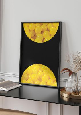 An unframed print of yellow double disc five graphical photograph in black and yellow accent colour