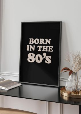 An unframed print of born in the 80's graphical in typography in black and white accent colour