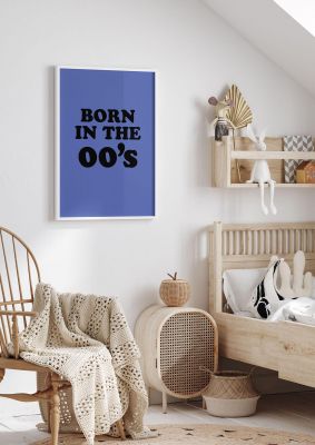 An unframed print of born in the naughties graphical in typography in blue and black accent colour