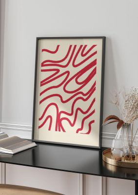 An unframed print of abstract red shaggy line graphical in beige and red accent colour