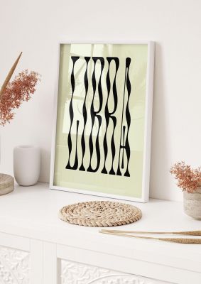 An unframed print of star sign libra graphical illustration in green and black accent colour