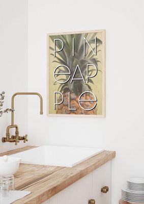 An unframed print of pineapple travel in typography in beige and green accent colour