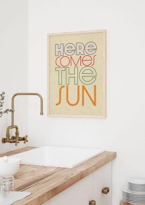An unframed print of here comes the sun graphical in typography in beige and multicolour accent colour