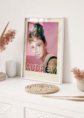 An unframed print of audrey hepburn famous paintings photograph in pink and beige accent colour