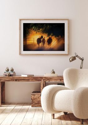 An unframed print of herd of horses photograph in yellow and black accent colour