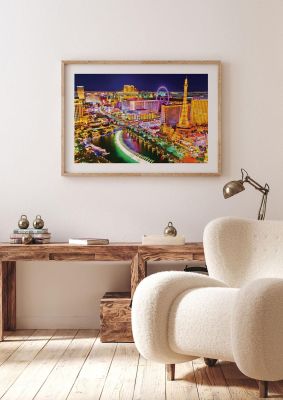 An unframed print of las vegas boulevard at night travel photograph in purple and yellow accent colour