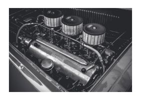 An unframed print of old ferrari engine graphical photograph in grey