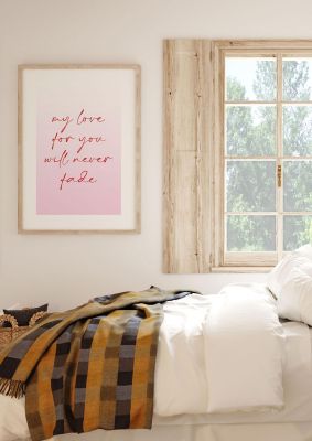 An unframed print of my love for you will never fade in typography in pink and red accent colour