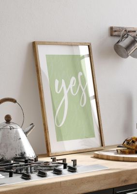 An unframed print of yes quote in typography in green and white accent colour