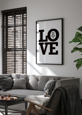 An unframed print of all you need is love in typography in white and black accent colour