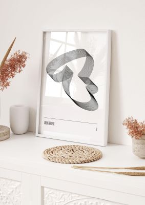 An unframed print of liquid shapes seven monochrome abstract in white and silver accent colour