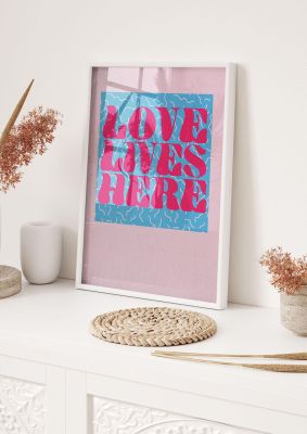 An unframed print of love lives here textured quote in typography in blue and pink accent colour